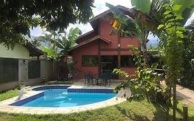 Casa de praia com piscina e clima de montanha